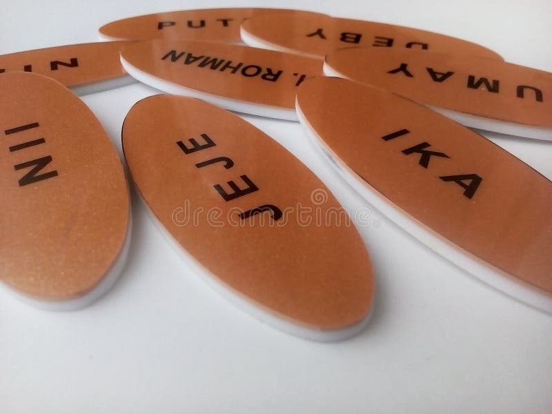 A Set of Chest Names or Emblems with Different Names in Brown Made of