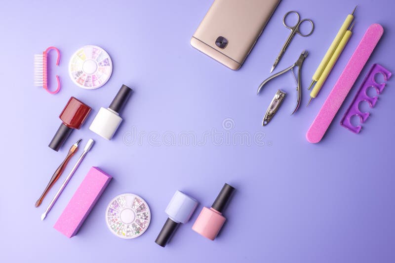 Set Of Cosmetic Tools For Manicure And Pedicure On A Purple Background ...