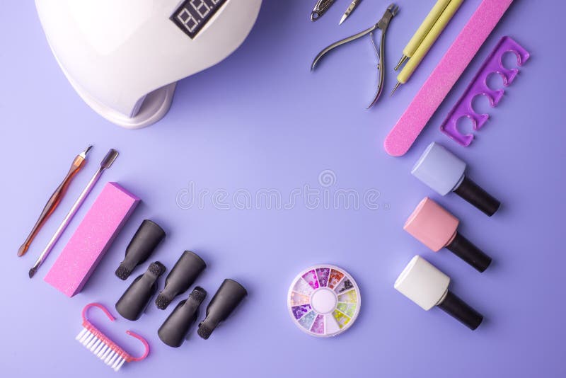 Set Of Cosmetic Tools For Manicure And Pedicure On A Purple Background ...