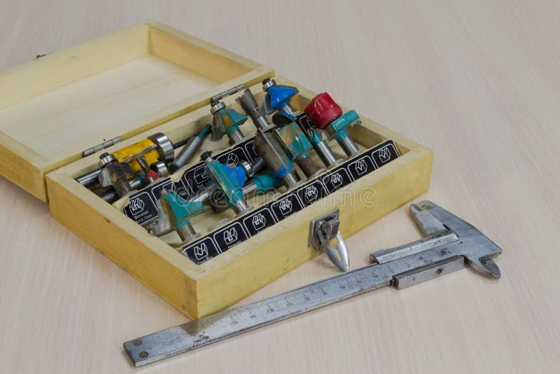 A Set of Cutters for Wood of Different Shapes in a Box Stock Photo