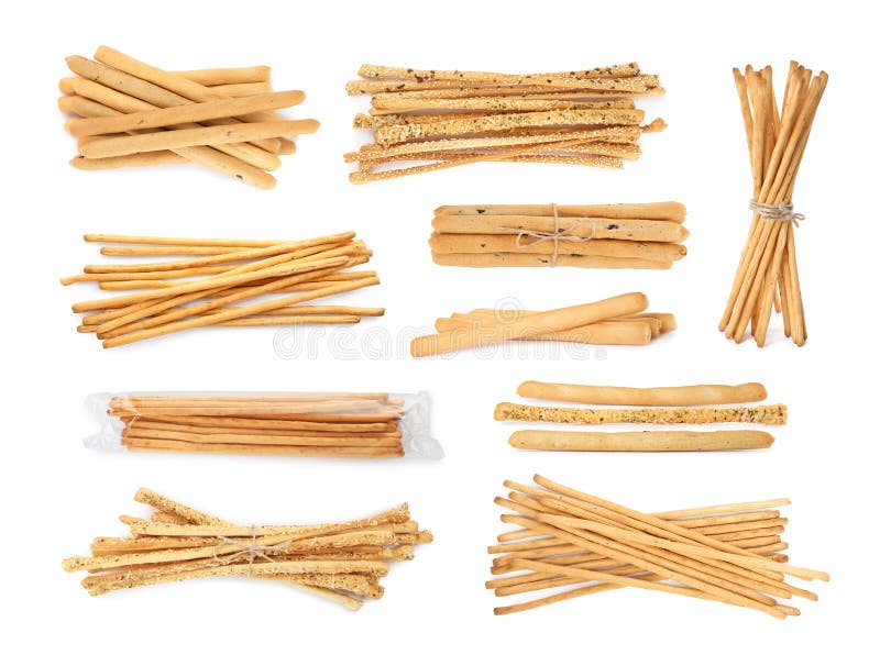 Set with Delicious Crispy Grissini Sticks on White Background Stock ...