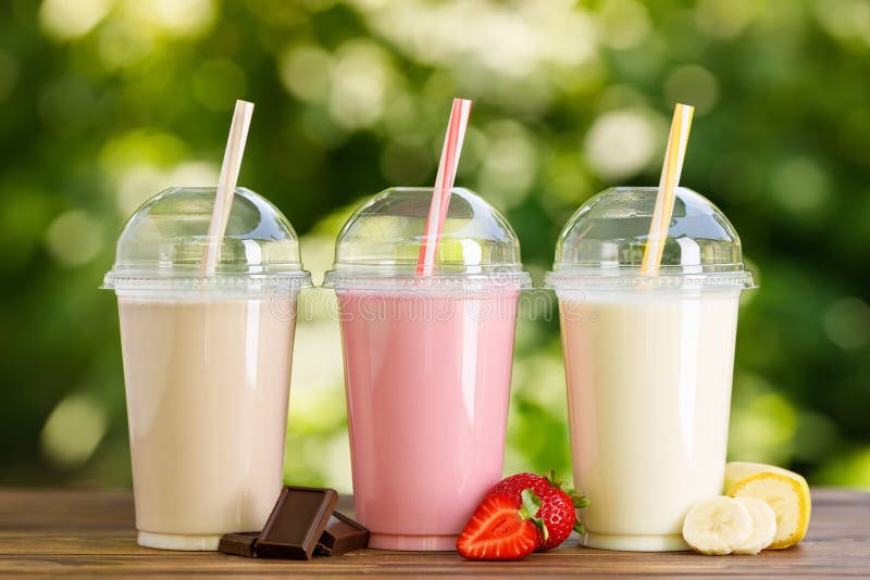 https://thumbs.dreamstime.com/b/set-different-milkshakes-disposable-plastic-glasses-wooden-table-outdoors-223927854.jpg