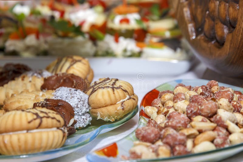 Set of Different Nuts and Sweets on a Table. Catering Food Party Stock