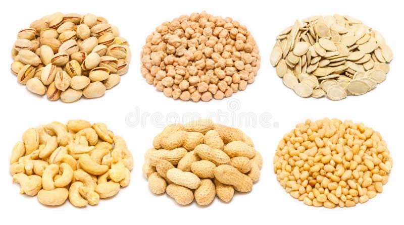 Set of different types of nuts and seeds - pistachio nuts in the shell, chickpea seeds without shell, pumpkin seeds in the shell, raw cashew seeds without shell, peanut in the shell, peeled pine nut kernels