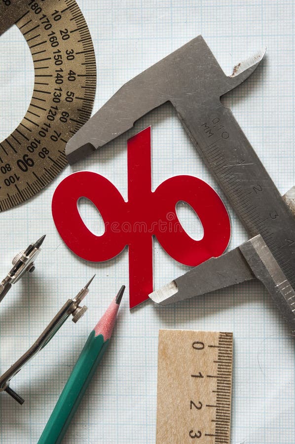 Set of drawing instrument and rulers on graph paper royalty free stock photography