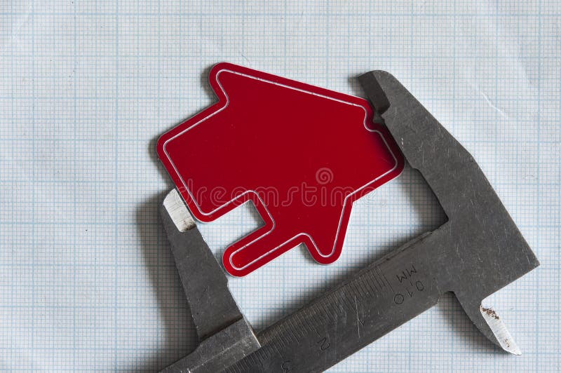 Set of drawing instrument and rulers on graph paper stock image