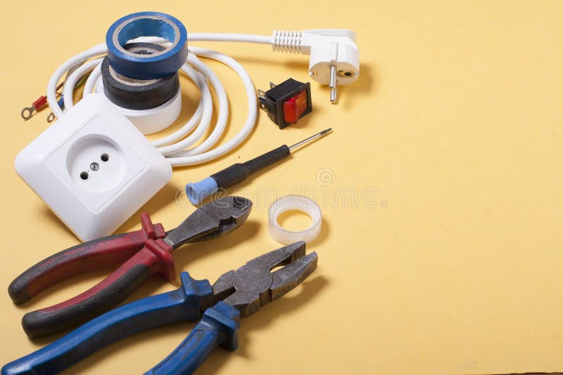 Set of Electrical Tool on Wooden Background. Accessories for Engineering Work, Energy Concept