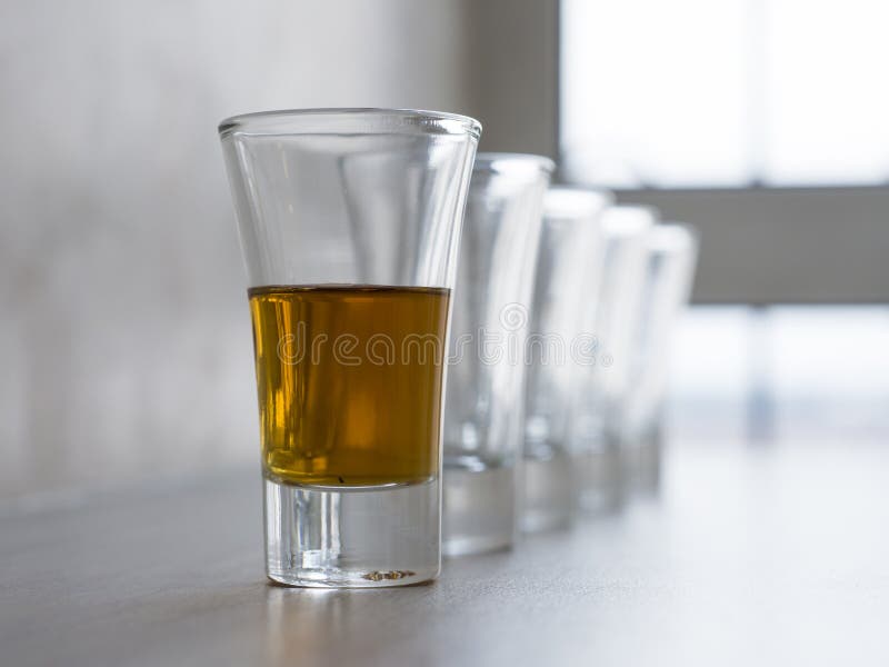Set of empty wine, brandy, liqueur, tincture, cognac, whiskey glasses. Copy space for text royalty free stock photos Set of empty wine, brandy, liqueur, tincture, cognac, whiskey glasses. Copy space for text royalty free stock photos