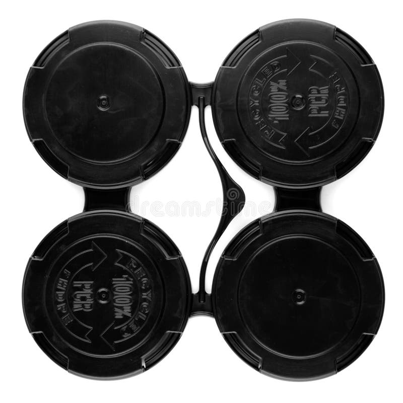 Set of four connected plastic lids for cups stock photo
