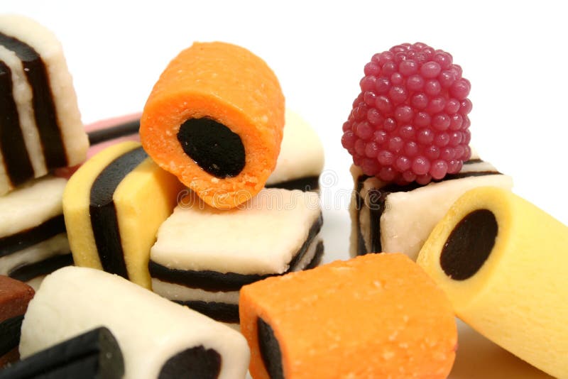 Set of fruit sweets in the form of beaters of various color