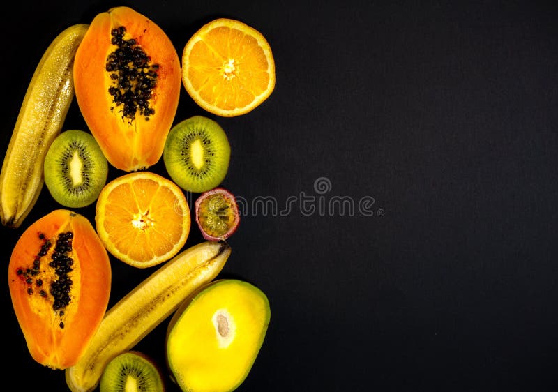A set of fruits, fruit is from the left and a free space on the right, black background royalty free stock photo A set of fruits, fruit is from the left and a free space on the right, black background royalty free stock photo