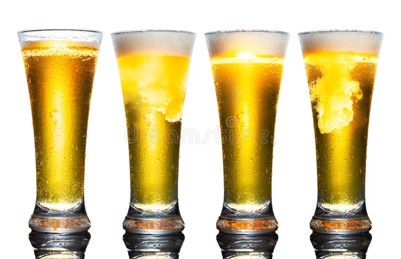 Set of a glass of cold light beer with foam isolated on white background. royalty free stock photo