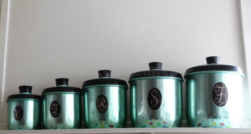 Set of green anodized antique kitchen canisters