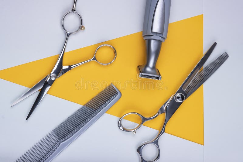 Set of hairdressing tools scissors, comb and shaving machine. Flat layt. royalty free stock photography Set of hairdressing tools scissors, comb and shaving machine. Flat layt. royalty free stock photography