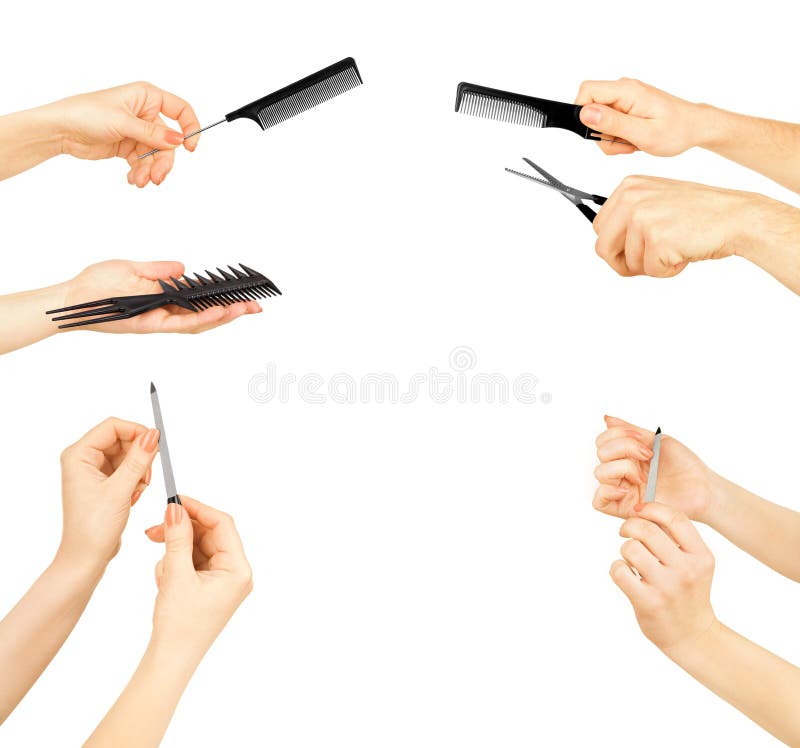 Set of hands holding a pair of scissors stock photography