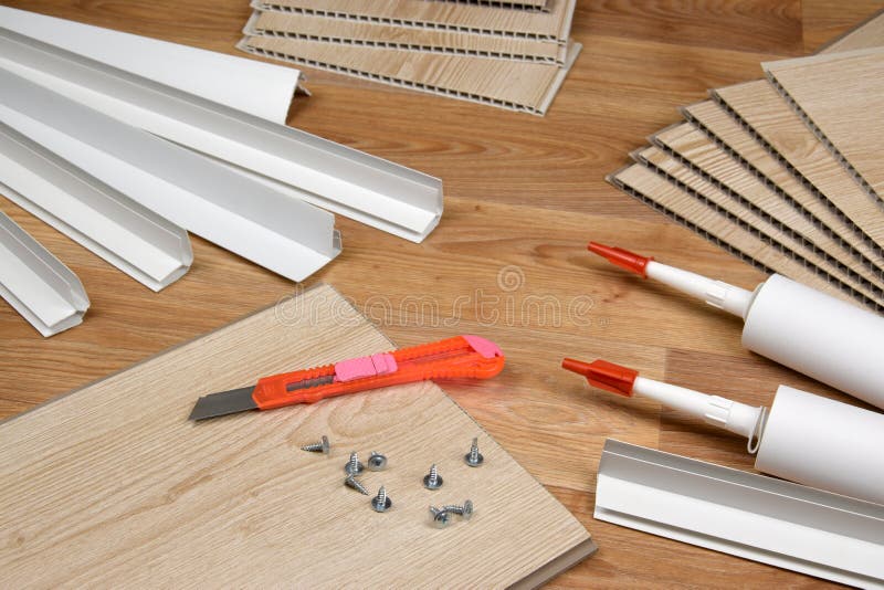 Set of Items for PVC Ceiling Indoor Works. Assembly Adhesive Bottles