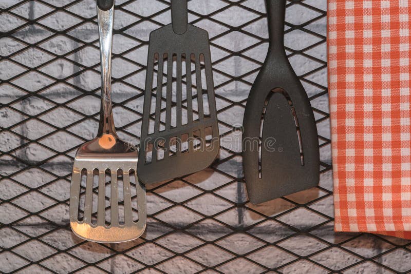 Set of Kitchen Utensils Hanging on the Wall Stock Photo Image of