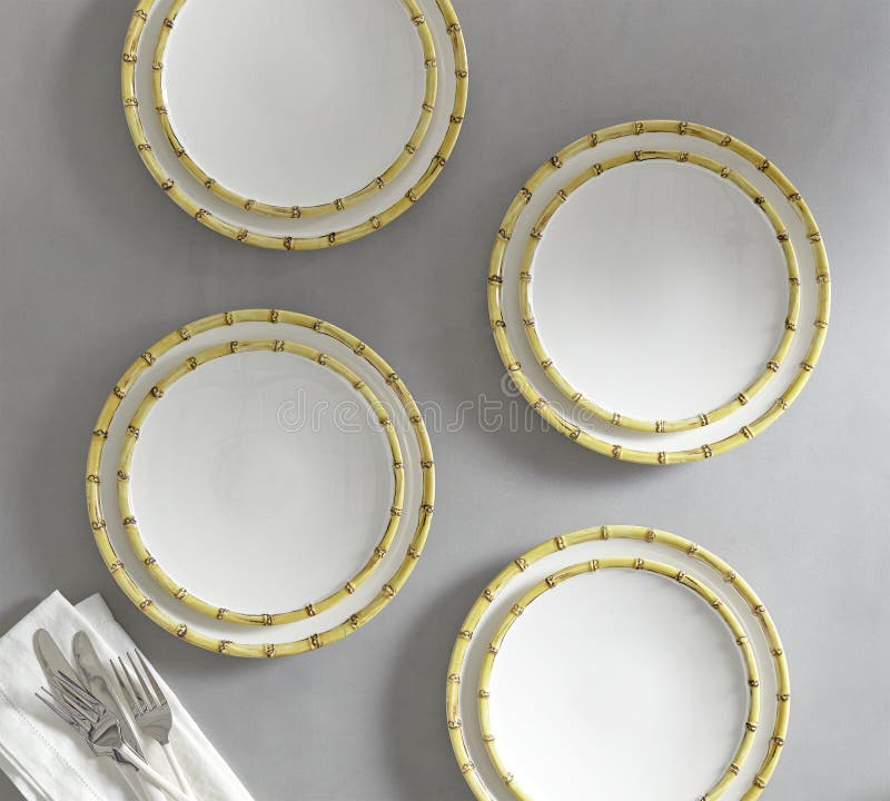 Set of 4 matching decorative plates for interior design - yellow waves. Vector illustration royalty free stock images