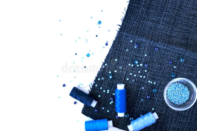 A set of materials for needlework in blue color stock images A set of materials for needlework in blue color stock images