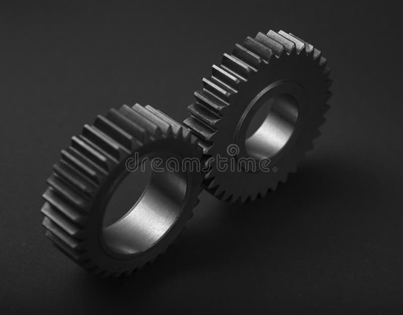 Set of Metal Gears Exposed on Black Surface Stock Image Image of
