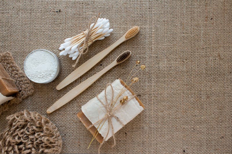 Set of natural bathroom and home spa tools. Zero waste. Ecotolls toothbrushes, bamboo swabs, soap, dry shampoo, toothpowder, jute