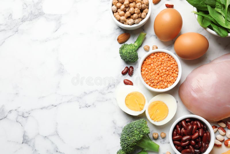 Set of Natural Food High in Protein and Space for Text on Marble
