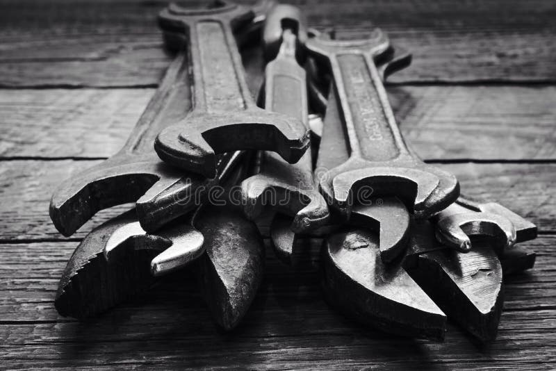 Set of Old Iron Wrenches on Wood Background Stock Photo - Image of