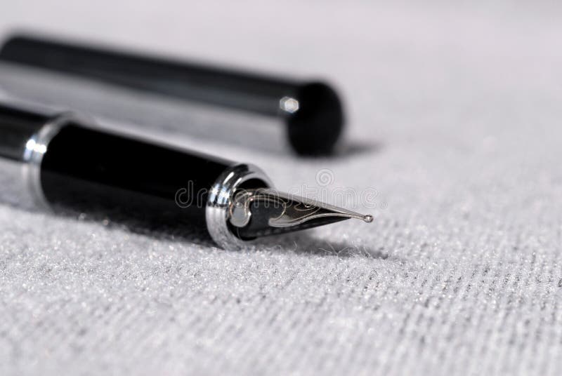 Set of pens for writing on a light background. Shallow depth of field.