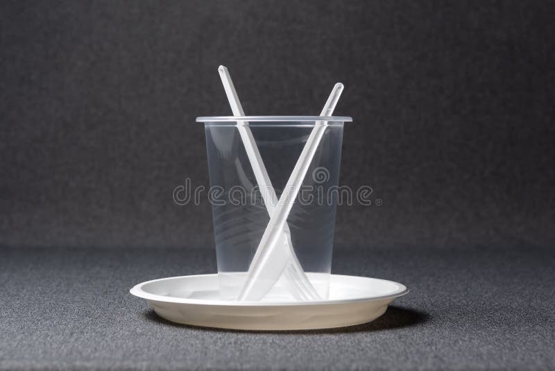 Disposable Plastic Tableware. Cups, Plates, Forks, Knives and Spoons