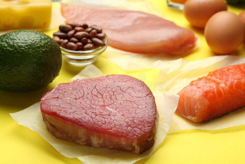 Set of Products Rich in Amino Acids on Yellow Background Stock Photo