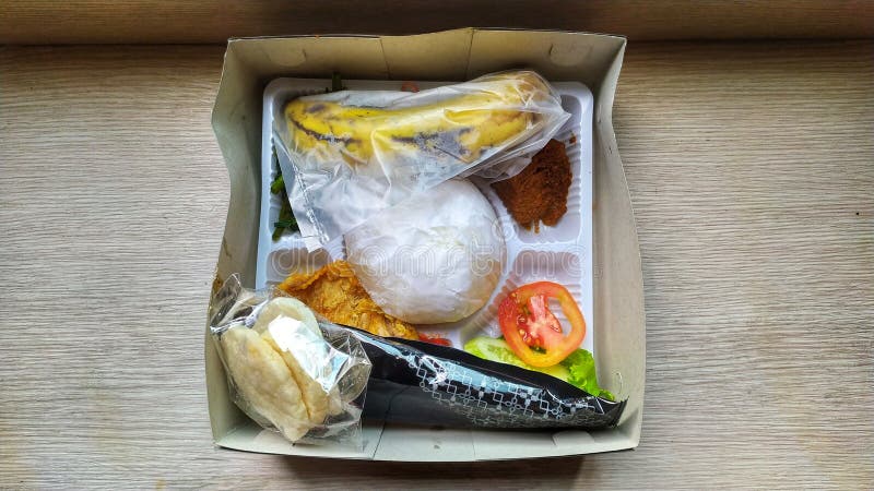 A Set of Rice with Side Dishes, Vegetables and Bananas Stock Image