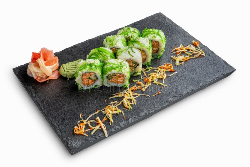 Set of Rolls with Wasabi and Pickled Ginger on Stone Serving Board