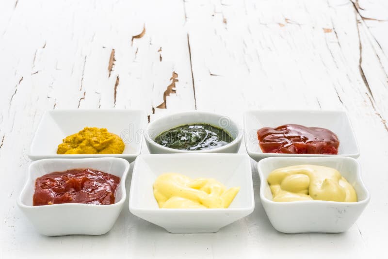 Set of sauces on a white table royalty free stock image Set of sauces on a white table royalty free stock image