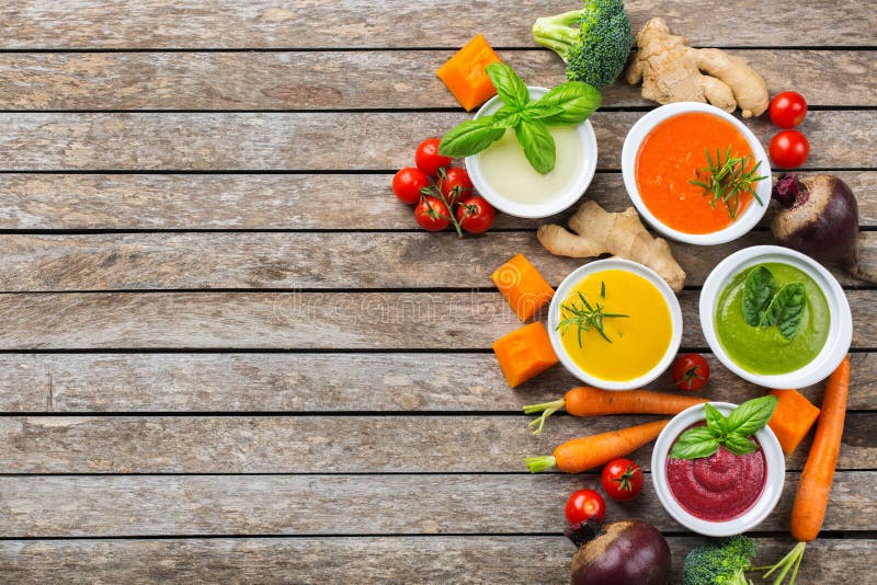 Set of seasonal fall autumn creamy soups on a table.