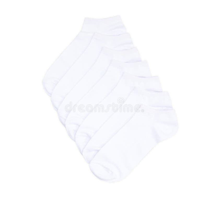 Set of short white socks isolated on white background. Seven pair of socks royalty free stock image