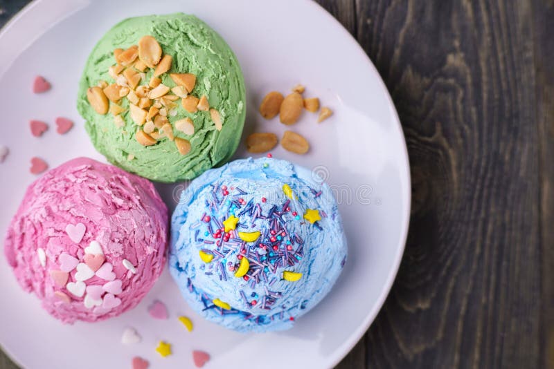 Set of strawberry, pistachio and blueberry flavored ice cream sc royalty free stock photo Set of strawberry, pistachio and blueberry flavored ice cream sc royalty free stock photo
