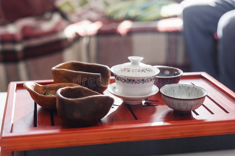 Set of Teapot, Three Kinds of Tea and Four Bowls Stock Photo Image of