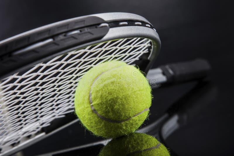 A set of tennis. Racket and ball. Studio shot