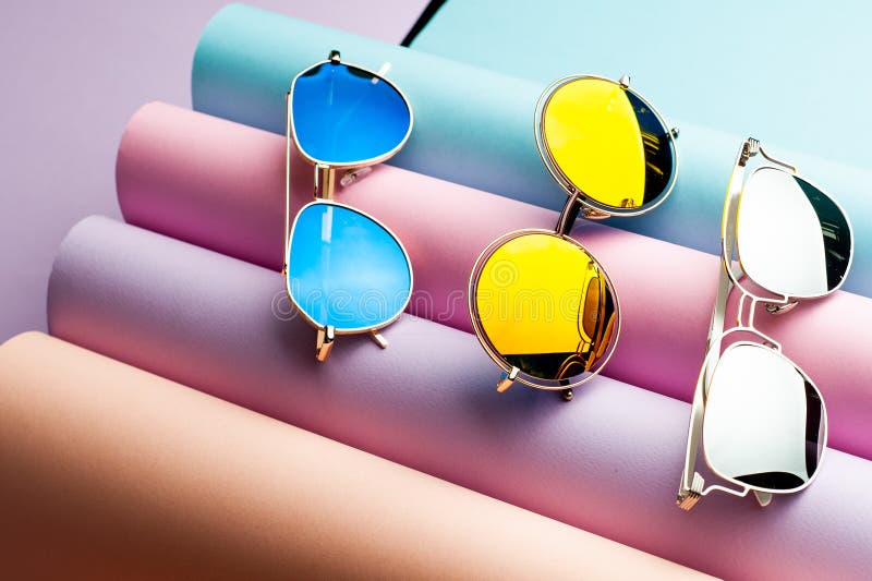 Sunglasses  :  different bright colored funky glasses for UV protection from the sun. Eye glass