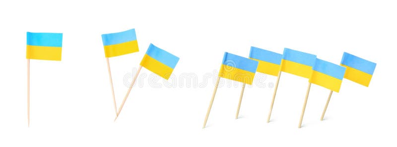 Set of toothpicks with Ukrainian flags on white background. Banner design stock image