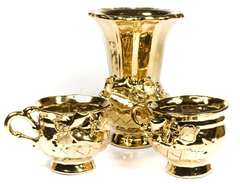 Set from two gold cups and vase