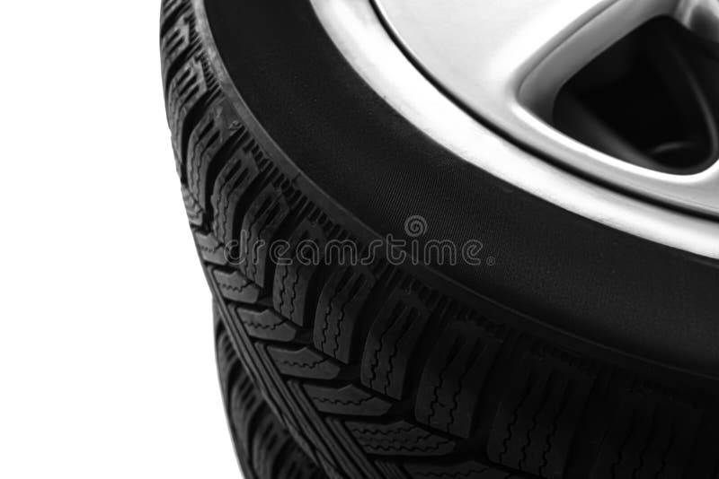 Set of Wheels with Winter Tires on White Background, Closeup Stock