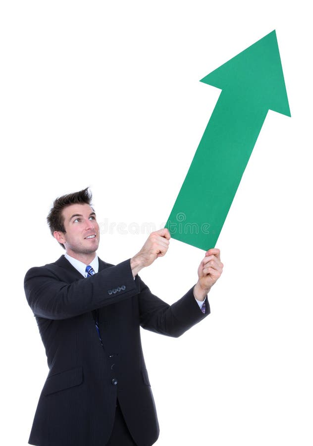 A business man holding a green arrow up indicating success. A business man holding a green arrow up indicating success