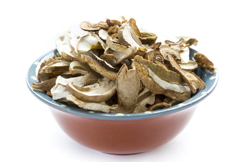 Setas secadas del boleto en cuenco imagenes de archivo