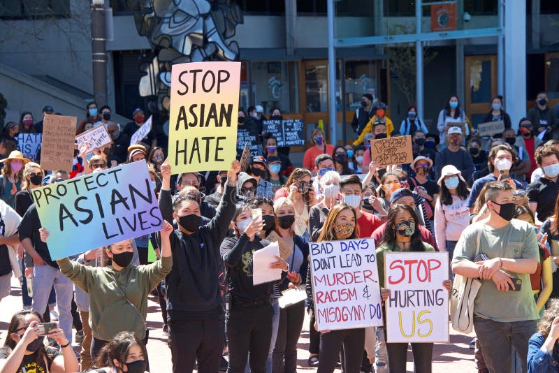 San Francisco, CA - Mar 26, 2021: Unidentified participants at a youth lead anti-Asian Violence Rally at Embarcadero after marching down Market Street. San Francisco, CA - Mar 26, 2021: Unidentified participants at a youth lead anti-Asian Violence Rally at Embarcadero after marching down Market Street