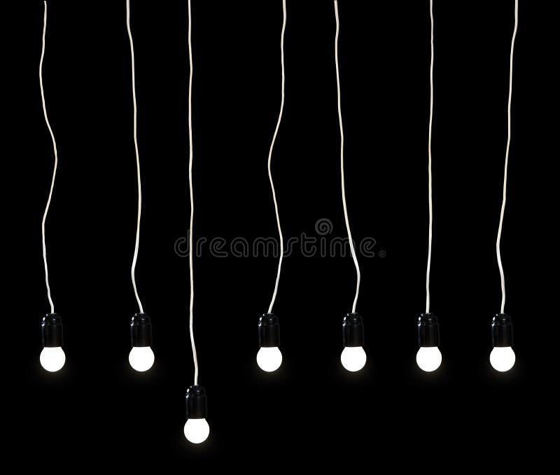 Seven electric lamps on a black background. Seven electric lamps on a black background