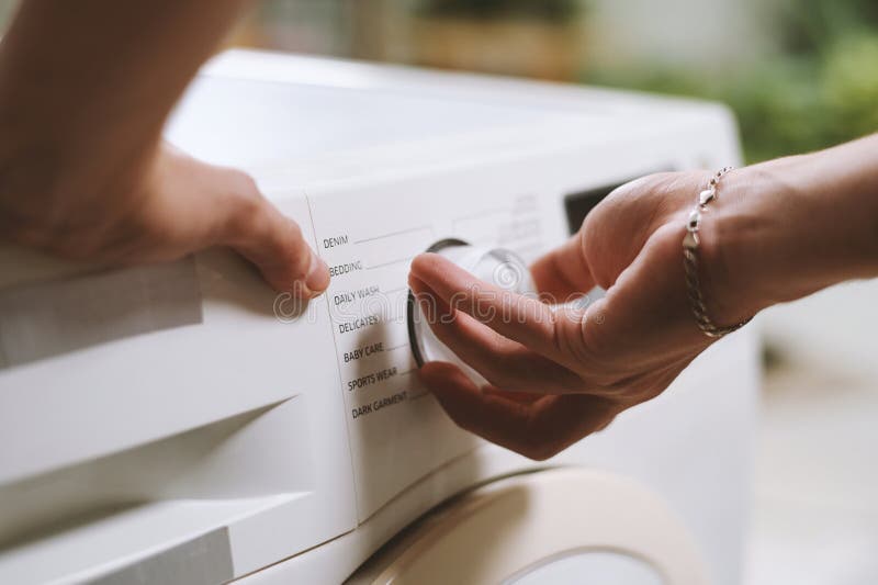 Setting Cycle on Washing Machine Stock Image Image of routine, person