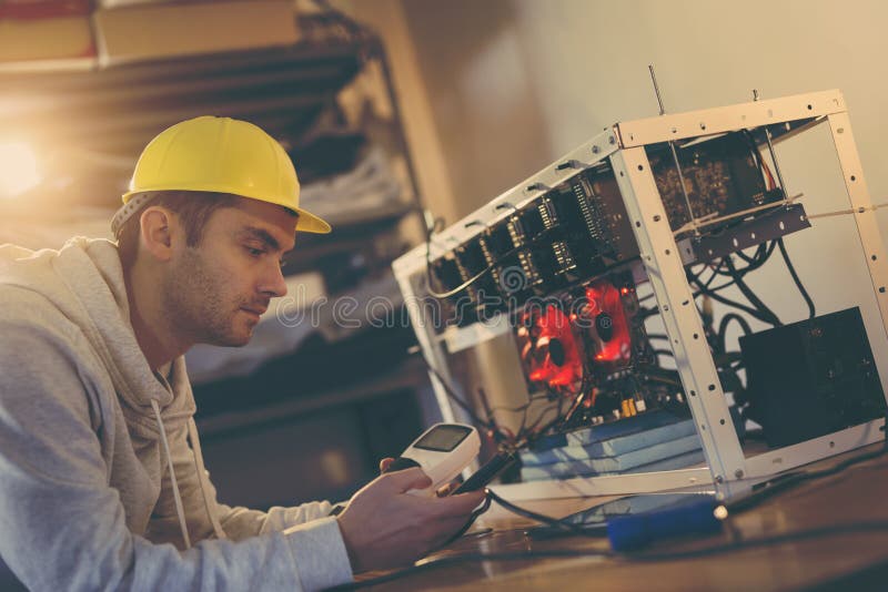 Setting up a mining rig electrical energy consumption stock photo