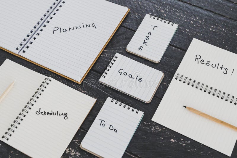 Setting Up for Success, Business Desk with Notebooks with Elements from 