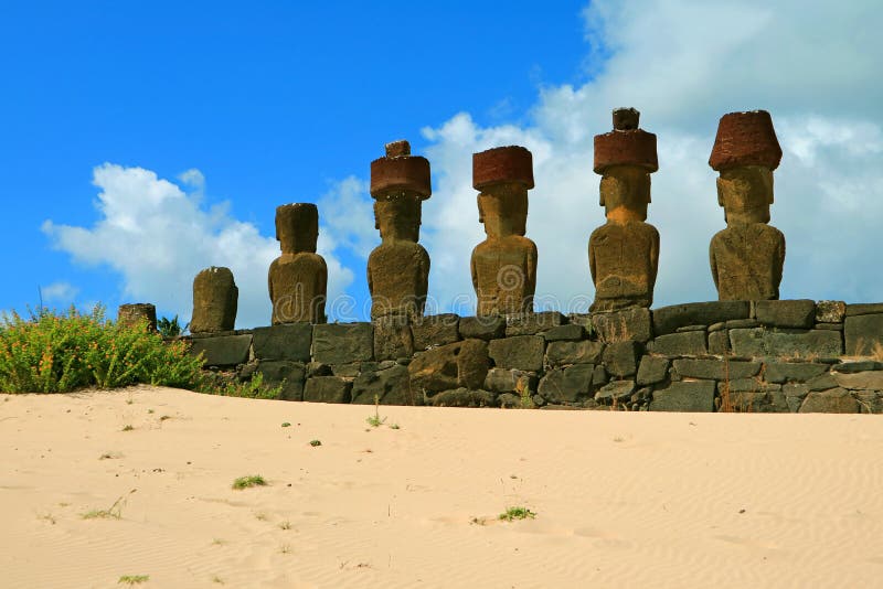 Seven Gigantic Moai Statues of Ahu Nau Nau Ceremonial Platform from the Back, Anakena Beach, Easter Island, Chile royaltyfri fotografi